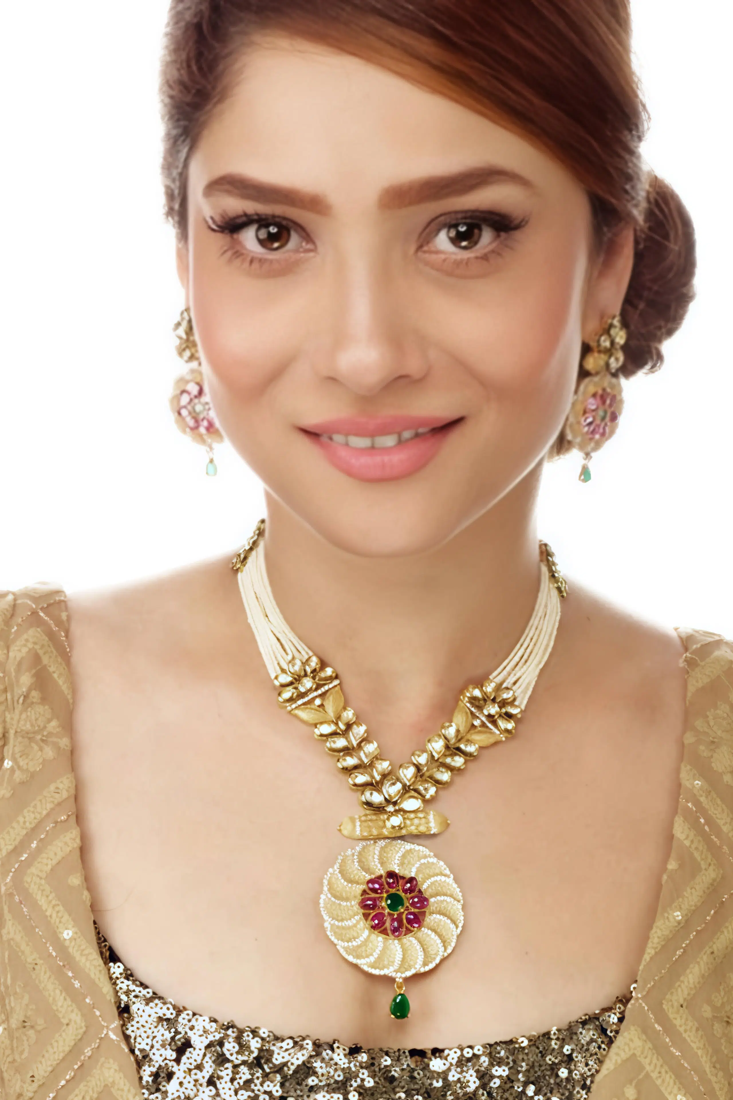 Beautiful indian model wearing diamond studded gold necklace, earrings posing for jewellery photography in mumbai