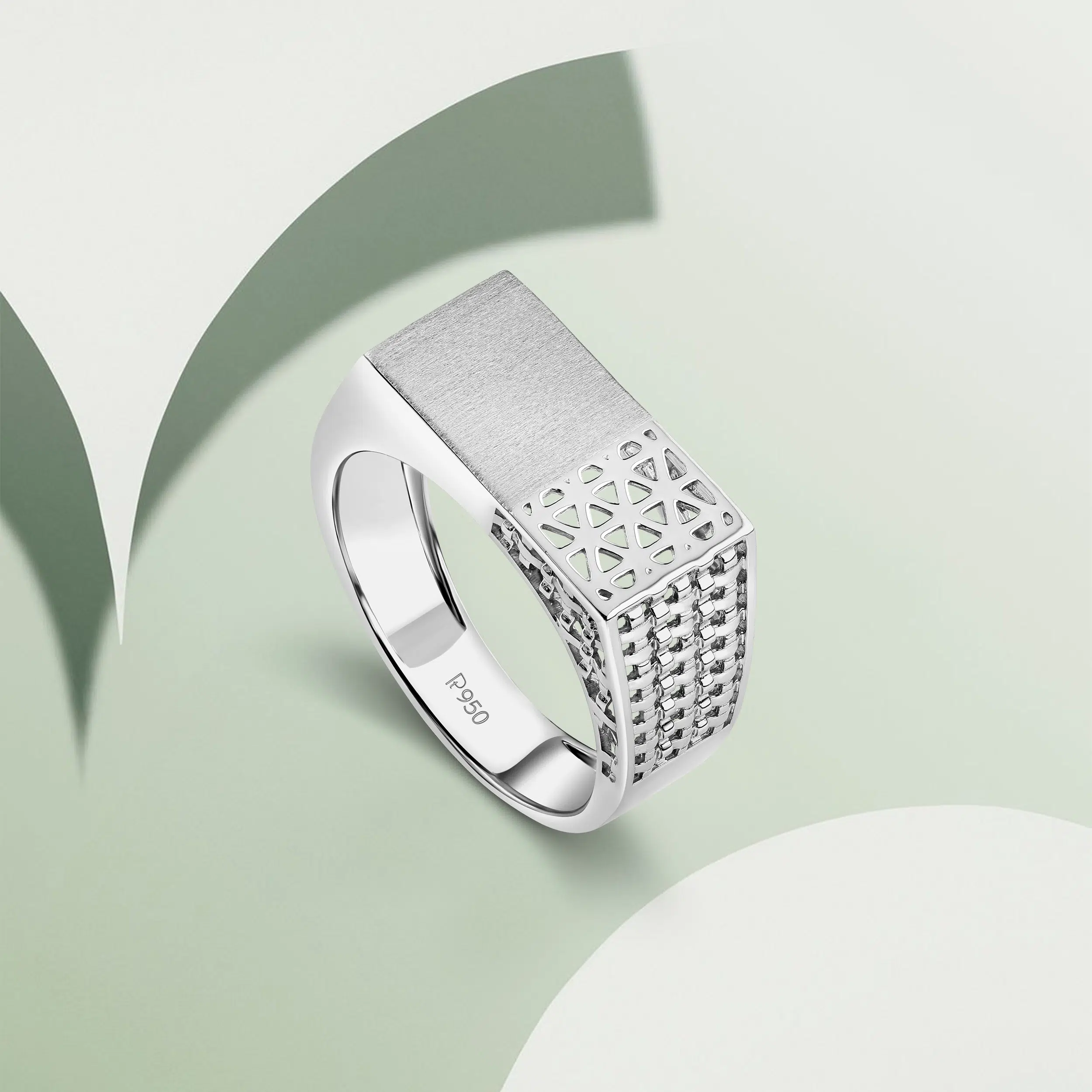 Creatively photographed men's platinum ring table top photography in mumbai