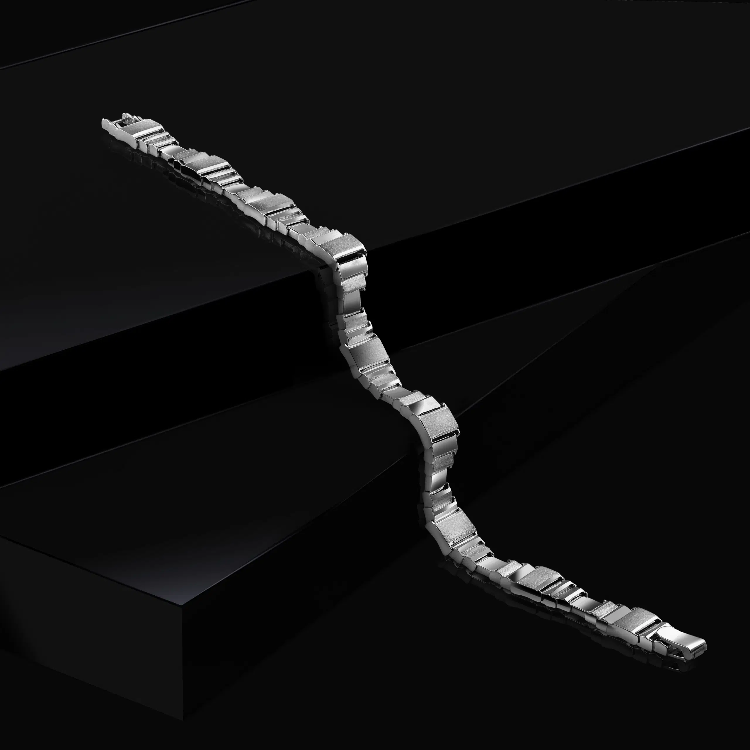 Premium flexible bracelet creatively placed on a black steps photographed and edited by team pankaj mathur
