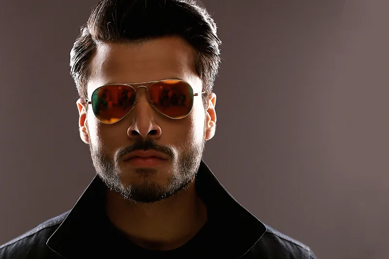 Handsome male model wearing sunglasses. Model portfolio photography in mumbai