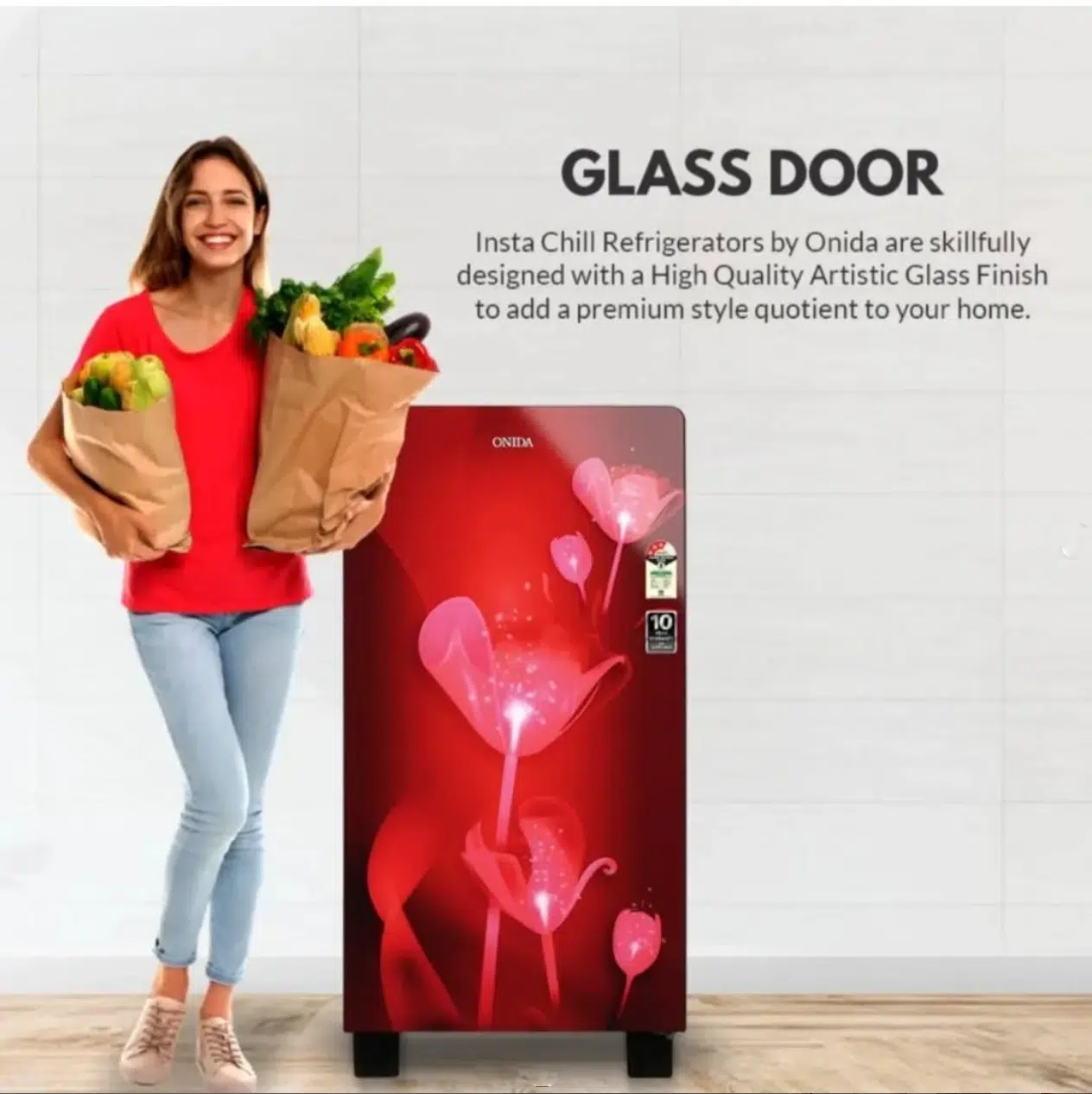 Female model posing with vegetables bags besides onida refrigerator product photoshoot in mumbai
