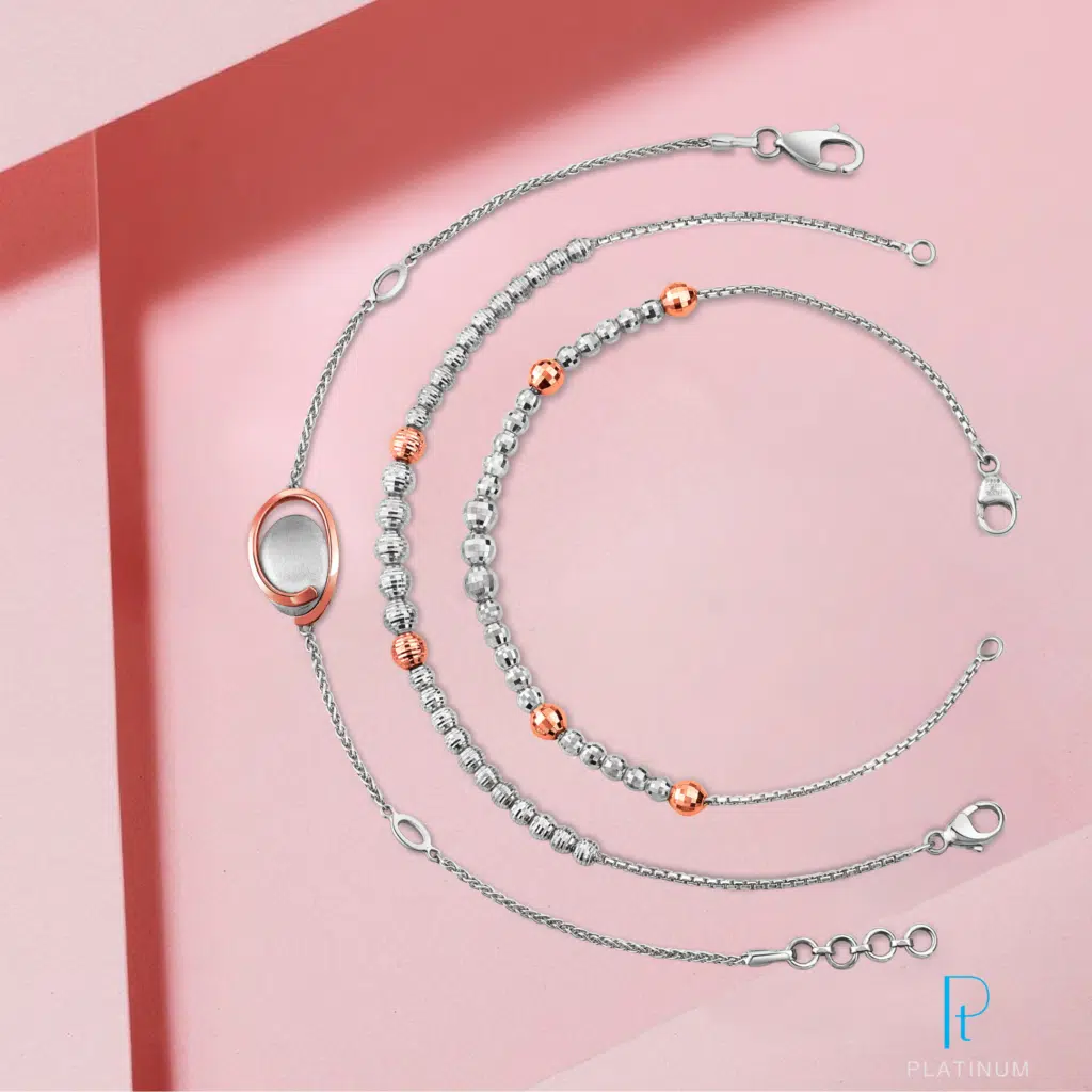 Flexible Platinum, Gold Bracelets for female shot on a creative Pink Background. Concieved , Photographed and edited by Team Pankaj Mathur