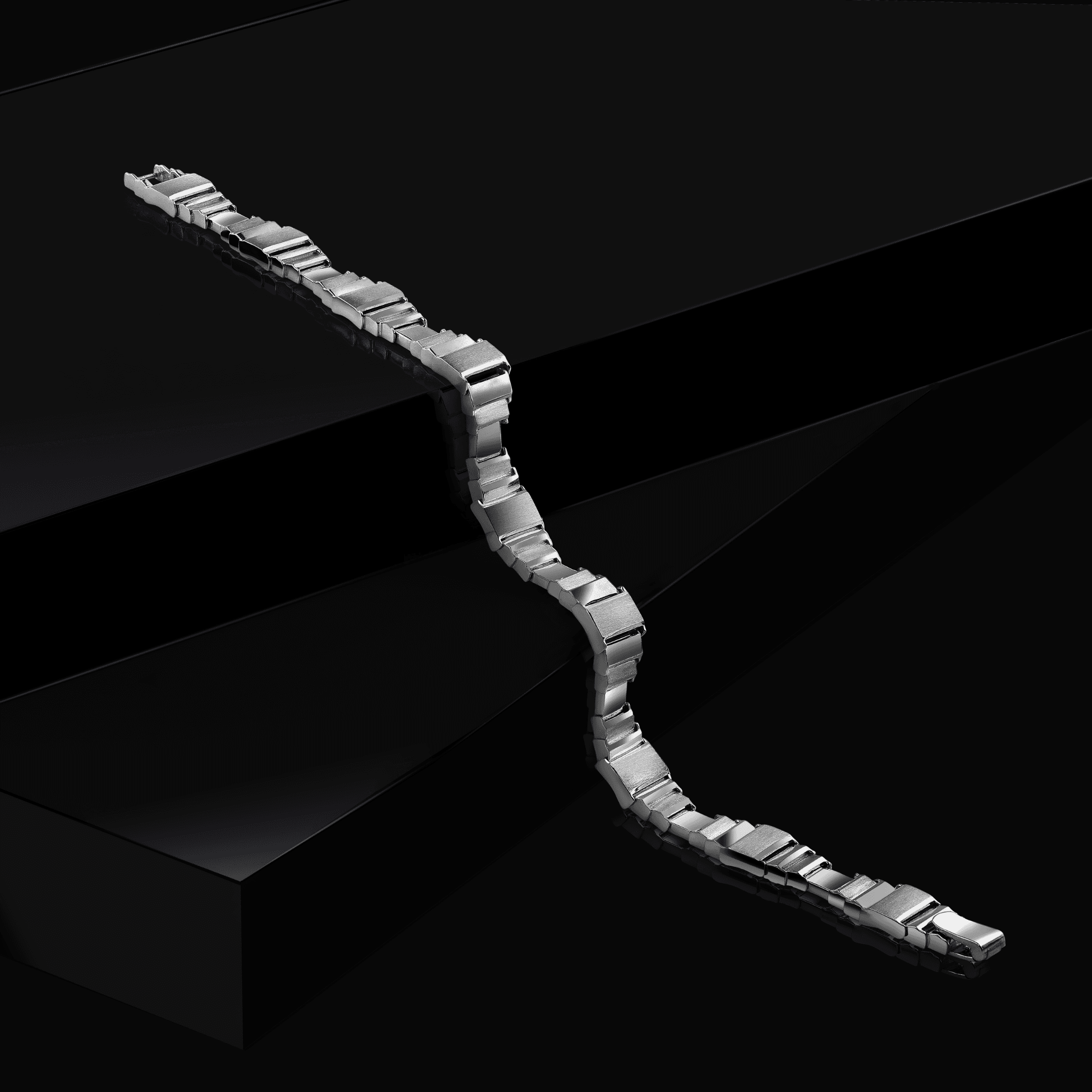 Platinum Jewellery Artistically Photographed on Black Steps to enhance the beauty of Platinum Jewellery. Photographed and edited in a Mumbai's Studio